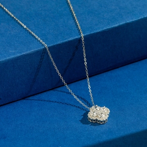Elegant 925 silver four-leaf clover pendant necklace with sparkling clear gemstones