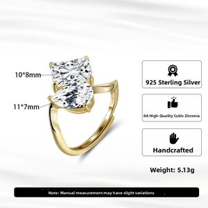 Macro detail of S925 sterling silver ring with 8A rectangle and pear cut cubic zirconia