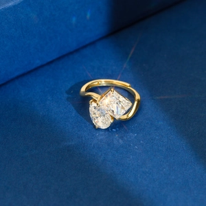 Close-up of S925 sterling silver gold ring with square and oval zirconia stones