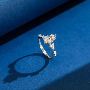 Elegant S925 silver ring with marquise-cut zircon gemstone on a navy textured background