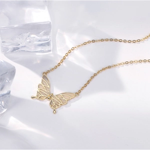 Gold S925 sterling silver butterfly pendant necklace with cream enamel on white background