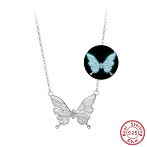 Glow-in-the-dark butterfly pendant in 925 sterling silver with blue luminous wings