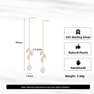 Detail of 925 silver gold-plated long chain earrings with natural pearls and dimensions
