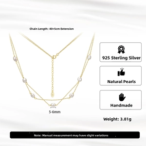 Detail of double-layer S925 sterling silver necklace with 5-6mm white pearls