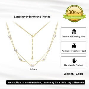 Detail of 925 sterling silver double-layer necklace with natural 5-6mm freshwater pearls