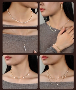 Detail showing irregular freshwater pearl necklaces and golden wheat leaf jewelry collection