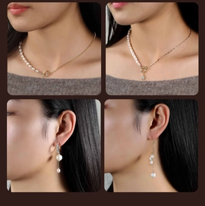 Detail of layered freshwater pearl necklace with star pendant on elegant knitwear