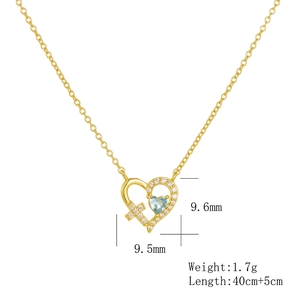 Détail du collier cœur en argent s925 avec croix, zircon bleu et mesures de dimension