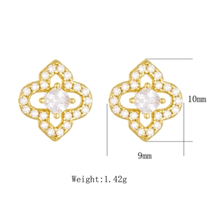 Detail view of gold clover stud earrings showing dimensions of 10mm height and 9mm width