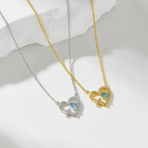 Collier coeur en argent S925 avec pierre bleue et détail croix ajourée