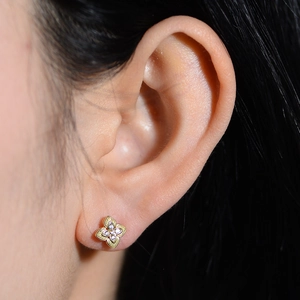 S925 sterling silver four-leaf clover stud earrings with sparkling crystals and gold finish