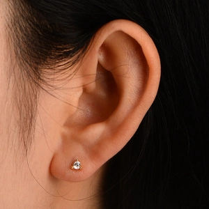 Minimalist 925 sterling silver stud earring with three-prong set clear cubic zirconia
