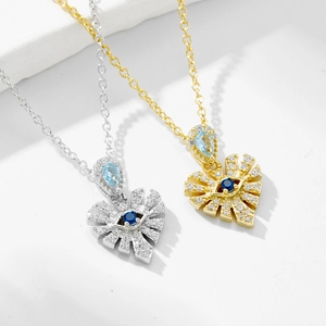 Collier cœur mauvais œil en argent 925 avec zircons bleus et chaîne en O classique