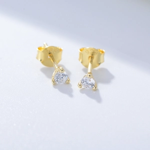 Macro shot of S925 sterling silver earring with three-prong round zircon and 925 hallmark