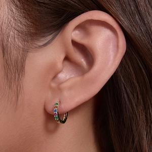 S925 sterling silver gold hoop earring with colorful cubic zirconia stones on female ear