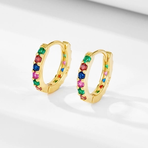 Close-up of S925 sterling silver gold earrings with colorful zircon stones and hallmark
