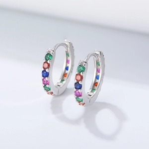 Detailed view of S925 sterling silver hoop earrings with vibrant rainbow cubic zirconia