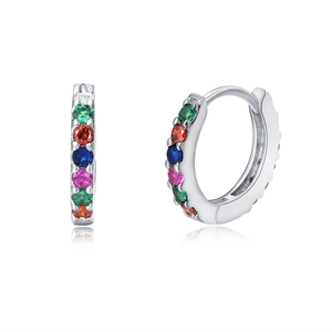 Macro detail of S925 silver hoop earrings featuring vibrant rainbow cubic zirconia stones