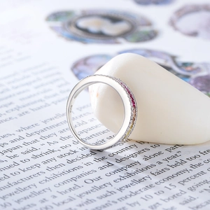 S925 sterling silver ring with colorful cubic zirconia stones on white pebble
