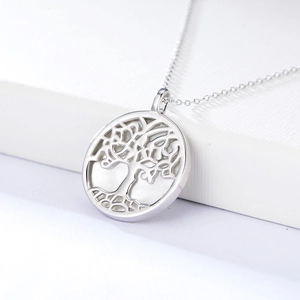 Close-up of s925 silver Tree of Life pendant necklace with iridescent mother of pearl