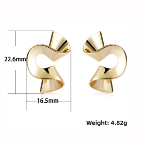 Detail view of irregular spiral earrings with dimensions 22.6mm by 16.5mm and 4.82g weight