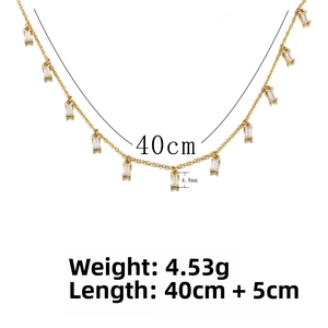 Detail of s925 silver gold tassel necklace with rectangular zircon pendant and chain scale