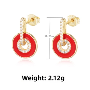 Close-up of S925 silver gold-plated earrings with red enamel rings and cubic zirconia