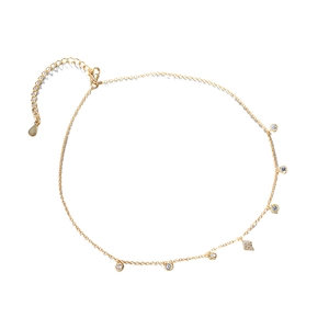 Elegant gold choker necklace with sparkling zircon charms and adjustable clasp on white background