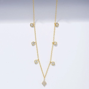 Elegant gold S925 sterling silver choker necklace with zircon pendants on white background