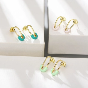 Detail of S925 sterling silver paperclip earrings with colorful enamel and gold plating