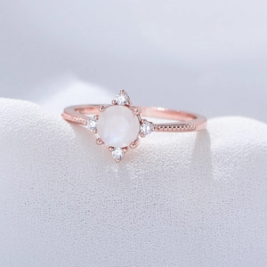 Elegant 925 sterling silver moonstone ring with rose gold finish and diamond accents