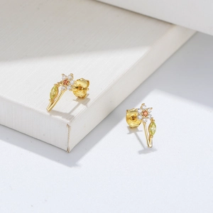 Detailed view of S925 silver flower earrings with zircon petals and gold plating