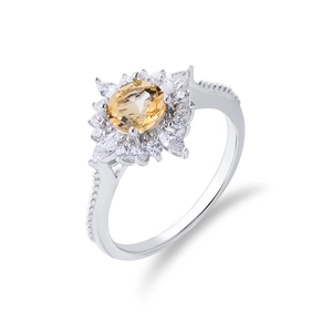 S925 Silberring mit ovalem gelbem Citrin und Markasit-Zirkon in floralem Sternendesign