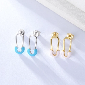 Detailed macro view of S925 sterling silver paperclip earrings with colorful enamel coating