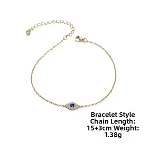 Detailed view of evil eye gold bracelet with micro-pave blue zircon and lobster clasp