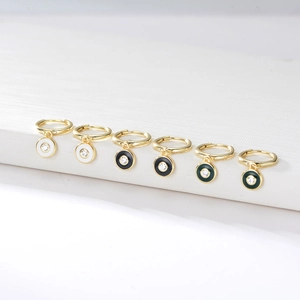 Detailed set of six gold hoop earrings with colorful enamel charms and central zircons
