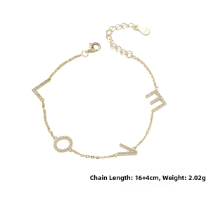 Macro shot of 925 stamp on a gold-plated bracelet with LOVE letter pendant set with zircons