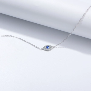 Macro shot of S925 sterling silver evil eye bracelet with blue zircon and pavé setting