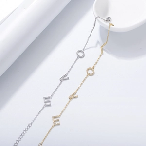 Minimalist LOVE letter bracelets in gold and silver finish with sparkling cubic zirconia
