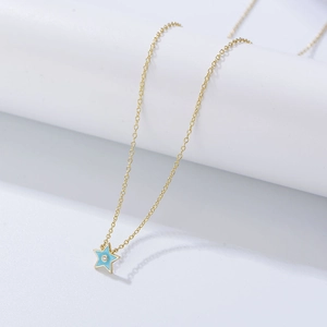 Collier en argent S925 doré avec pendentif étoile en émail bleu et petit diamant