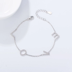 Elegant 925 sterling silver LOVE bracelet with sparkling cubic zirconia on a cable chain