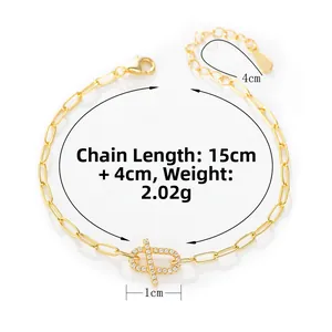 Detail view of gold S925 sterling silver paperclip bracelet with zircon oval charm