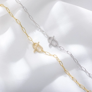 S925 sterling silver geometric link bracelet with micro-pave cubic zirconia on white silk