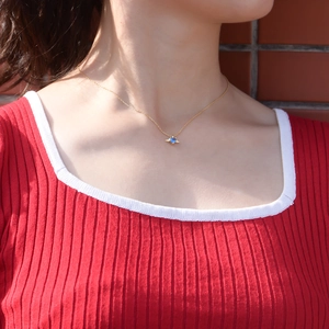 Elegant S925 silver angel wings necklace with blue heart zircon pendant on neck