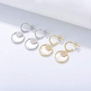 Orecchini a cerchio in argento S925 con pavé di zirconi e trama a spirale in oro e argento