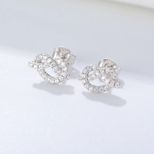 Minimalist S925 sterling silver knot stud earrings with shimmering white zircon stones