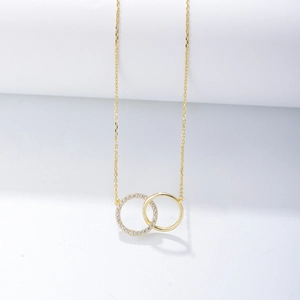 Macro view of interlocking double circles necklace with sparkling pave diamonds
