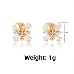 Macro detail of pink zircon flower stud earrings in gold with 7.22mm size specs