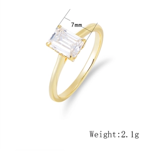 Detail of 7mm emerald cut zircon ring in gold finish with 2.1g weight specification