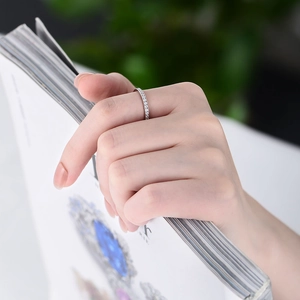 Elegantly worn S925 sterling silver full eternity ring featuring micro-pave cubic zirconia